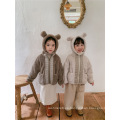 Jersey infantil de lana de cordero con costuras